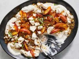 Nectarines on a bed of ricotta cream, dusted with a pistachio dukkah.