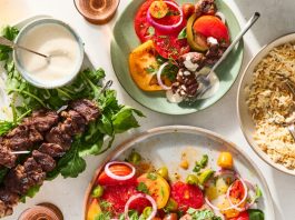 Salad Is a Star, Not a Side, in This Summery Spread A table filled with lamb kebabs, garlicky yogurt, tomato salad and an orzo pilaf.